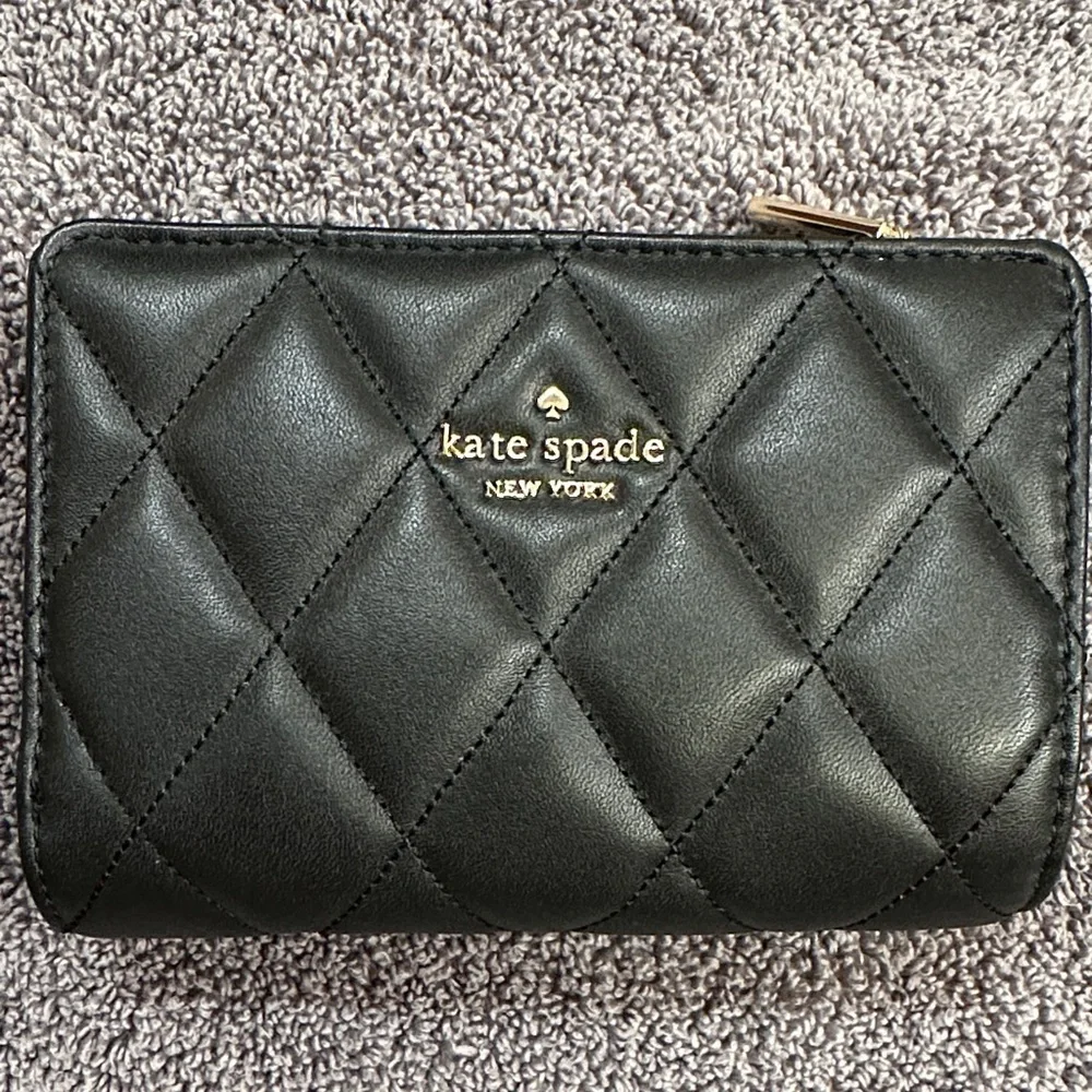 kate spade Medium Black Quilted Leather Zip-Around Wallet with Gold Logo